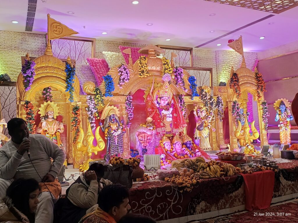 "Devotional Mata Ki Chowki featuring colorful rangoli and traditional offerings."