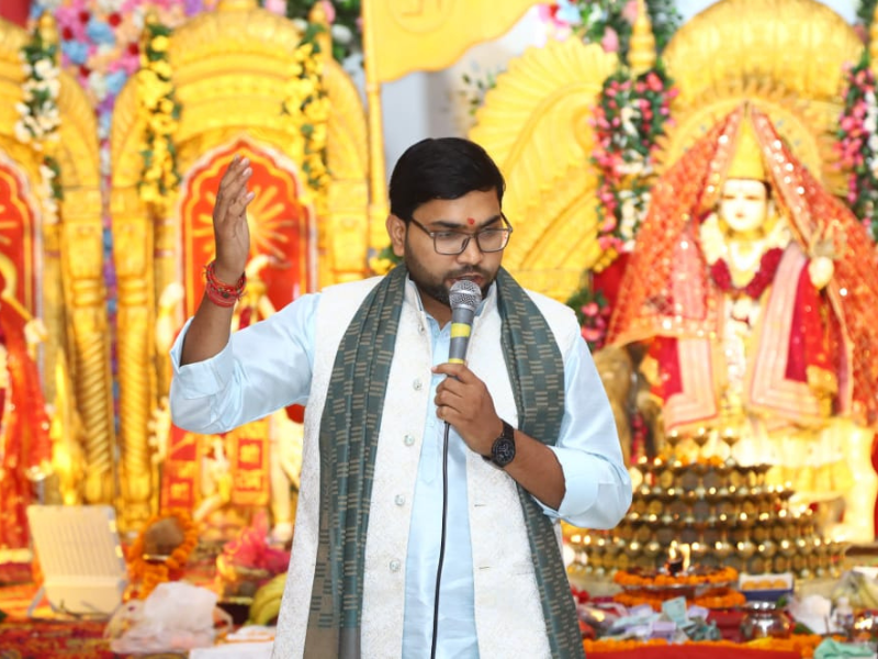 Deepak Mishra Ji leading Mata Ki Chowki at a Jagran Party in Ghaziabad by Mishra Sankirtan Mandal, with Maa Durga Darbar in the background.
